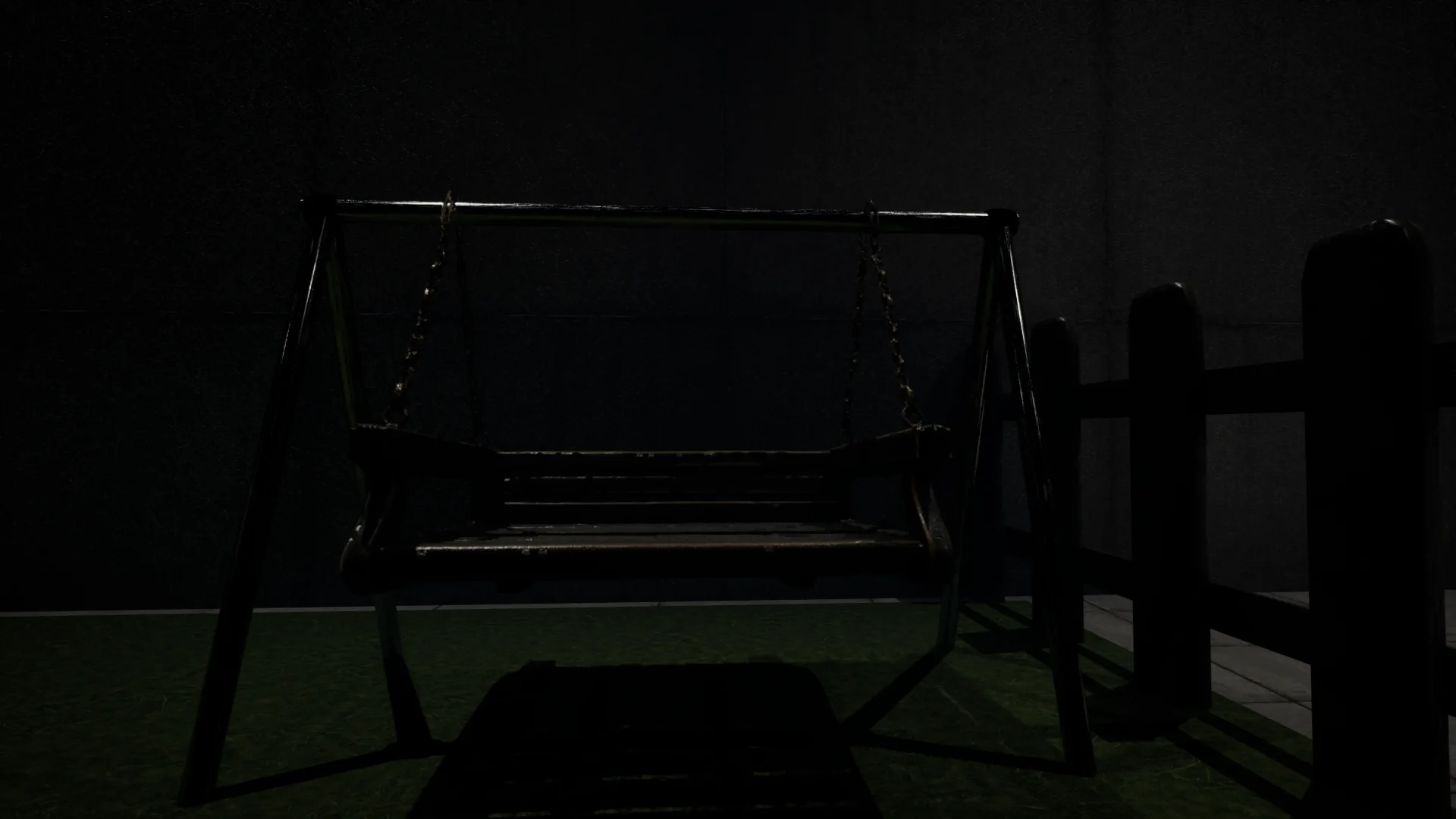 Dark swing in a quiet courtyard